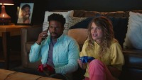 Two people watching a movie