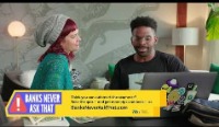 Two people looking at computer